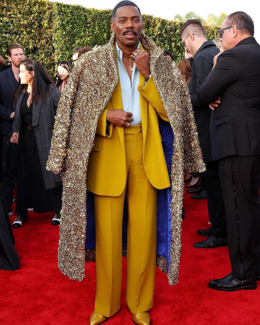 Colman Domingo wore a light blue Valentino shirt which he layered with a mustard yellow blazer and pants, and completed the look with a pair of Louboutin gold shoes. He also wore jewels from Bulgari, adding some shine and sophistication to his outfit.