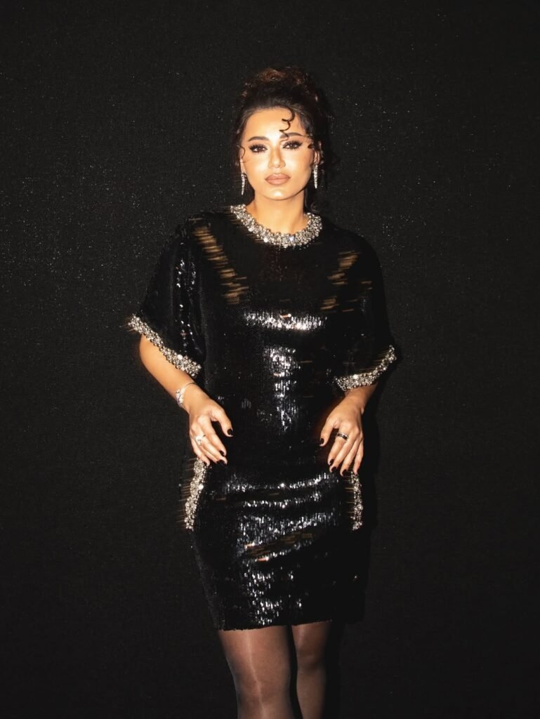 رحمة رياض بفستان أسود من توقيع زهير مراد